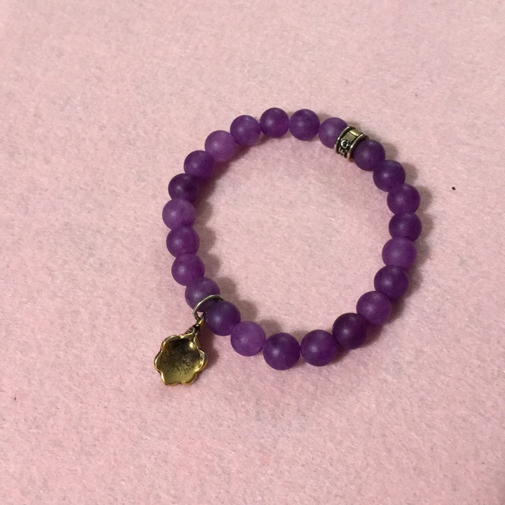 Purple beaded bracelet.
